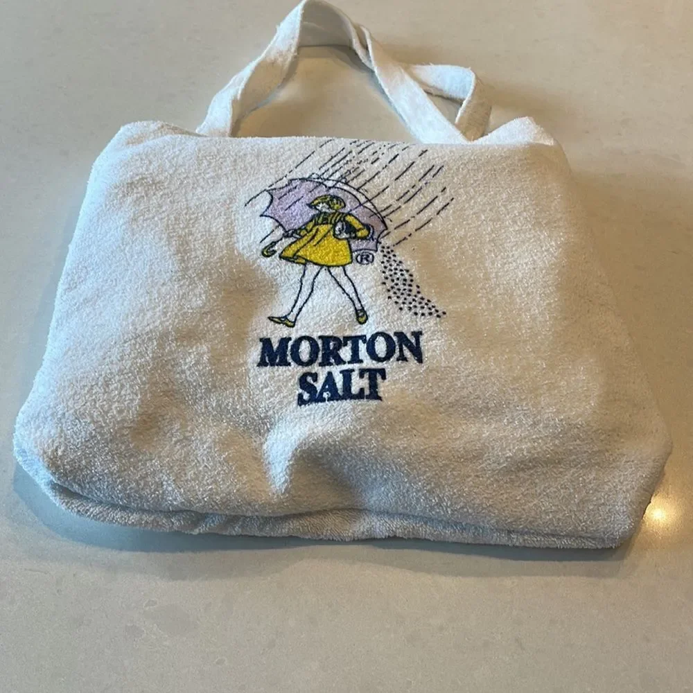 Morton salt vintage beach towel folds into carry tote , super cute. Excellent